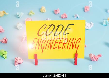Text sign showing Code Engineering. Business photo text application of engineering to the development of software Colored crumpled rectangle shaped re Stock Photo