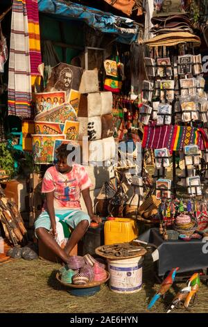 Ethiopia, Amhara Region, Gondar, trader at Handicraft Stall outside Fasil Ghebbi Stock Photo