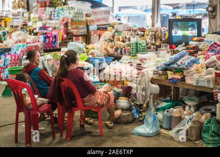 Local people looking on the tv in the market, Pakse, Laos, Asia Stock Photo