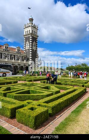 Dunedin railway station (1906) was designed by George Troup.  Anzac Square, Dunedin, New Zealand. Stock Photo