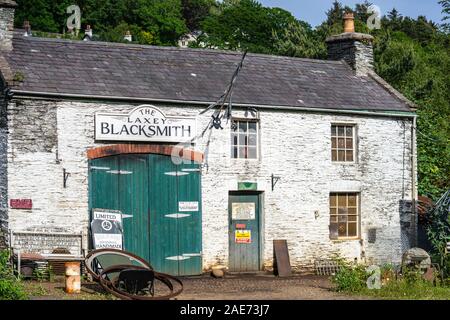 Laxey, Isle of Man, June 15, 2019. The Laxey Blacksmith Stock Photo