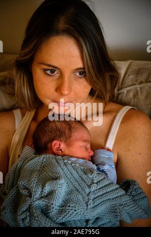 Young mother with her new born baby UK Stock Photo