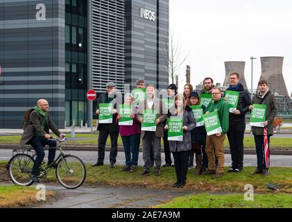 Grangemouth, Scotland, UK. 7th December 2019. Scottish Greens co-leader Patrick Harvie joined Linlithgow and East Falkirk candidate Gillian Mackay for a demonstration outside INEOS offices in Grangemouth. The refinery operated there by INEOS is Scotland’s biggest polluter according to the Greens. The Scottish Greens are calling for the end of shale gas imports, which bring fracked gas from the US to Grangemouth. Iain Masterton/Alamy Live News Stock Photo