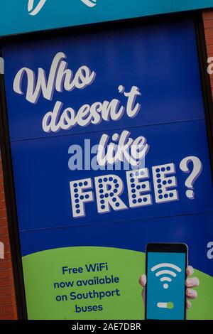Who doesn't like it free? Free WiFi advertising poster on Southport local public transport buses. UK Stock Photo