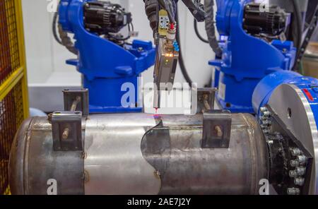 Seam tracking laser system for automated robotic welding Stock Photo