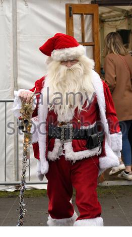 Edinburgh, Scotland, UK. 7th  Dec 2019.  Christmas Charity Festival in Stockbridge Edinburgh, the festival starts with the Santa Parade led by the Stockbridge Pipe Band, followed by santa and his reindeer, the route ends in Inverleith Park. Credit: Craig Brown/Alamy Live News Stock Photo