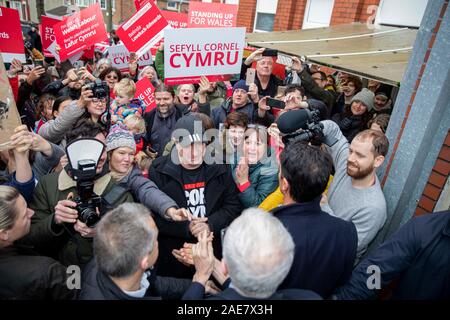 Barry, Wales, UK. December 7th 2019. Labour leader Jeremy Corbyn is greeted at a general election rally at Barry Island Sports and Social Club. Credit: Mark Hawkins/Alamy Live News Stock Photo