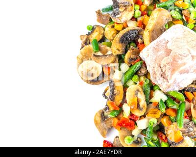 Frozen vegetables and meat on a white background with place for text. Food photo. Vegetable salad. Background image. Free place. Stock Photo