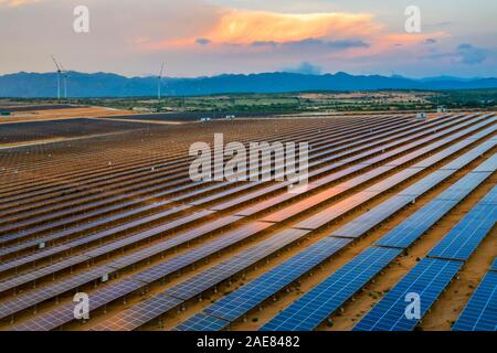 Aerial view of Solar panel, alternative electricity source - concept of sustainable resources on Phuoc Dinh, Ninh Phuoc, Ninh Thuan, Vietnam Stock Photo