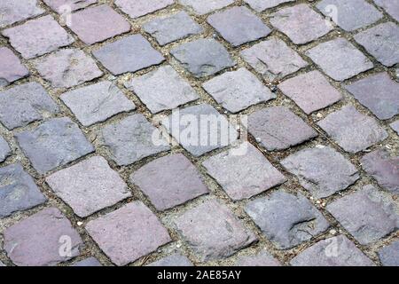 Very old pavement made from cobble stone Stock Photo