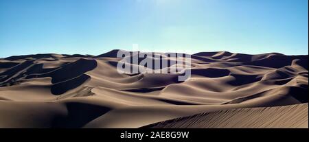 hot sand dunes and clear sky in lut desert Stock Photo