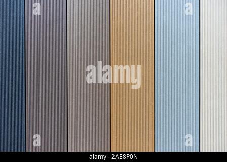 Background from waterproof boards of different colors. Terrace boards. Stock Photo