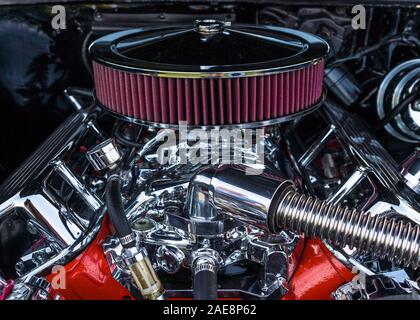 A photo of a beautiful and shiny chrome engine.  This is a photo of a fancy air intake / air filter and engine from a hot rod. Stock Photo