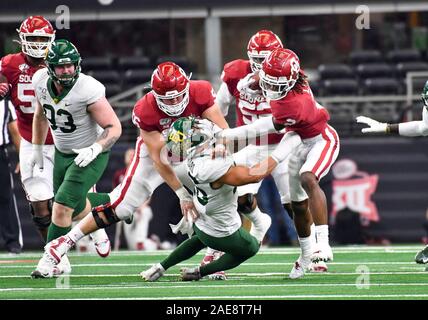 Dec 07, 2019: Oklahoma Sooners wide receiver CeeDee Lamb #2 gives a stiff arm as he carries the ball in the second quarter during the NCAA Big 12 Championship game between the Baylor University Bears and the University of Oklahoma Sooners at AT&T Stadium in Arlington, TX Albert Pena/CSM Stock Photo