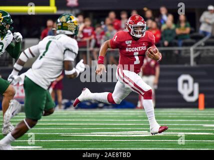 Dec 07, 2019: Oklahoma Sooners quarterback Jalen Hurts #1 scrambles with the ball in the first quarter for a first down during the NCAA Big 12 Championship game between the Baylor University Bears and the University of Oklahoma Sooners at AT&T Stadium in Arlington, TX Albert Pena/CSM Stock Photo