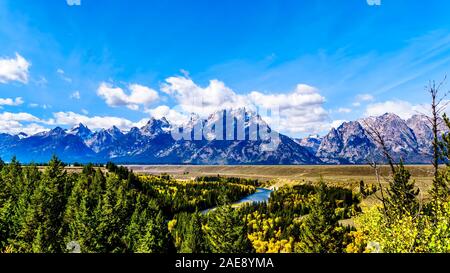 The peaks of The Grand Tetons behind the winding Snake River viewed from the Snake River Overlook on Highway 191 in Grand Tetons National Park, WY USA Stock Photo