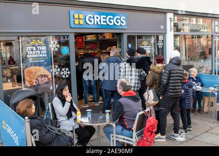 Chichester, West Sussex, UK December 07, 2019, Greggs PLC on a busy day in Chichester, Greggs are the largest bakery chain in the UK. Stock Photo