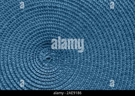 Blue textile as pattern. Circle texture. Background Surface Trendy color of the 2020 Year. Stock Photo