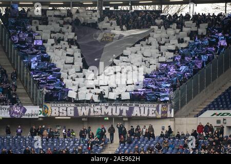 Hanover, Germany. 07th Dec, 2019. Soccer: 2nd Bundesliga, Hannover 96 - Erzgebirge Aue, 16th matchday in the HDI-Arena. Fans from Aue show a choreography before the game. Credit: Swen Pförtner/dpa - IMPORTANT NOTE: In accordance with the requirements of the DFL Deutsche Fußball Liga or the DFB Deutscher Fußball-Bund, it is prohibited to use or have used photographs taken in the stadium and/or the match in the form of sequence images and/or video-like photo sequences./dpa/Alamy Live News