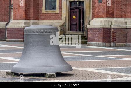 One of the original bells from the bell tower of St Michael's on display in the platz square Hamburg Germany Stock Photo