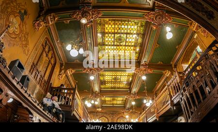 BUCHAREST, ROMANIA - NOVEMBER 26, 2019: Inside in the old restaurant CARU' CU BERE (Beer Carriage Restaurant) dating from 1899 and renovated based on Stock Photo