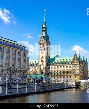 Tower and Rathaus City Hall and Rathausmarkt beside Alster Stairs on Kleine Alster waterfront Altasadt Hamburg Germany Stock Photo