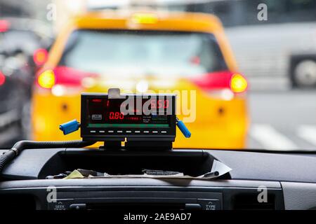 NEW YORK, NY - MARCH 23, 2016: View from cab with taxi meter display in New York Stock Photo