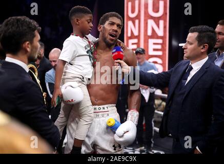 Anthony Joshua after reclaiming the IBF, WBA, WBO & IBO World Heavyweight Championship belts from Andy Ruiz (not pictured) at the Diriyah Arena, Diriyah, Saudi Arabia. Stock Photo