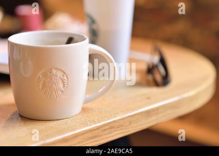 https://l450v.alamy.com/450v/2ae9ca5/penang-malaysia-09-june-2019-starbucks-take-away-coffee-cup-with-logo-bokeh-interior-background-starbucks-is-the-worlds-largest-coffee-house-wi-2ae9ca5.jpg