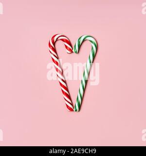 Two sweet caramel Christmas folded in the shape of a heart Stock Photo