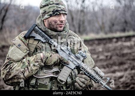 Portrait of modern army infantryman on march Stock Photo