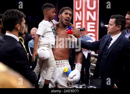 Anthony Joshua after reclaiming the IBF, WBA, WBO & IBO World Heavyweight Championship belts from Andy Ruiz (not pictured) at the Diriyah Arena, Diriyah, Saudi Arabia. Stock Photo