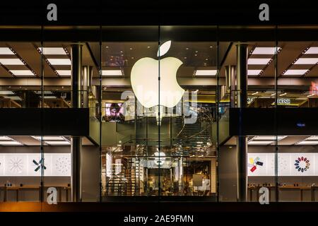 HongKong - November,  2019: The Apple Logo on Apple Store facade in Hongkong at night