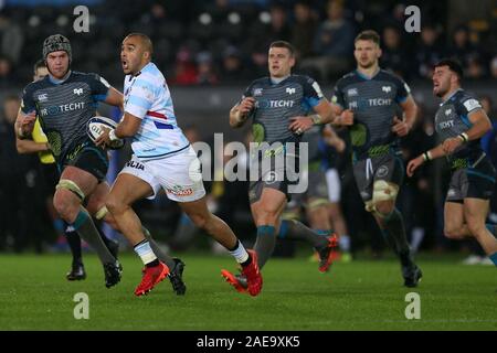 Swansea, UK. 07th Dec, 2019. Simon Zebo of Racing 92 makes a break. Heineken champions cup match, pool 4, Ospreys v Racing 92 rugby at the Liberty Stadium in Swansea, South Wales on Saturday 7th December 2019. pic by Andrew Orchard, Credit: Andrew Orchard sports photography/Alamy Live News Stock Photo