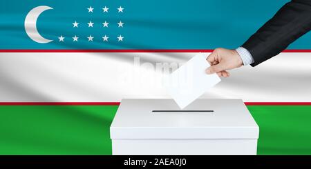 Election in Vanuatu. The hand of man putting his vote in the ballot box. Waved Vanuatu flag on background. Stock Photo