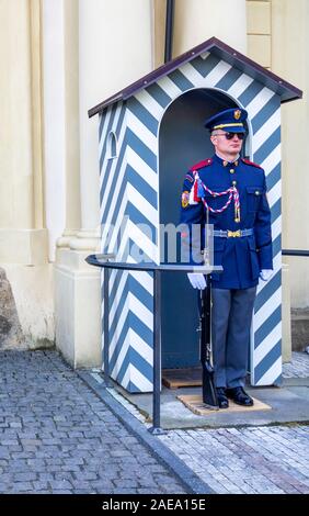 Prague Castle Guard in front of sentry box at Imperial Stables entrance to Prague Castle complex Prague Czech Republic.