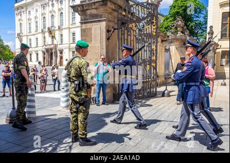 Prague Castle Guards marching during the changing of the guards ceremony at the Giants' Gate First Courtyard Prague Castle Prague Czech Republic. Stock Photo