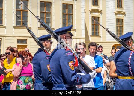 Prague Castle Guards marching during the changing of the guards ceremony at the Giants' Gate First Courtyard Prague Castle Prague Czech Republic.