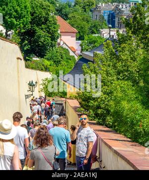 Tourists walking along Staré zámecké schody Old Castle Stairs Prague Czech Republic. Stock Photo