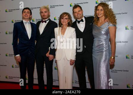 Washington DC, USA. 07th Dec, 2019. Sally Field, center, and, from left to right, guest of son, Armand De La Torre, son Samuel Greisman, son Eli and wife, Sasha Craig arrive for the formal Artist's Dinner honoring the recipients of the 42nd Annual Kennedy Center Honors at the United States Department of State in Washington, DC on Saturday, December 7, 2019. The 2019 honorees are: Earth, Wind & Fire, Sally Field, Linda Ronstadt, Sesame Street, and Michael Tilson Thomas. Credit: MediaPunch Inc/Alamy Live News Stock Photo