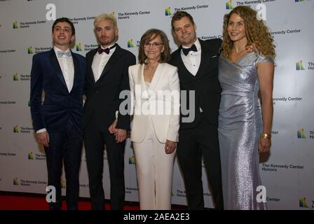 Washington DC, USA. 7th Dec, 2019. Sally Field, center, and, from left to right, guest of son, Armand De La Torre, son Samuel Greisman, son Eli and wife, Sasha Craig arrive for the formal Artist's Dinner honoring the recipients of the 42nd Annual Kennedy Center Honors at the United States Department of State in Washington, DC on Saturday, December 7, 2019. The 2019 honorees are: Earth, Wind & Fire, Sally Field, Linda Ronstadt, Sesame Street, and Michael Tilson Thomas. Credit: Ron Sachs/CNP/ZUMA Wire/Alamy Live News Stock Photo
