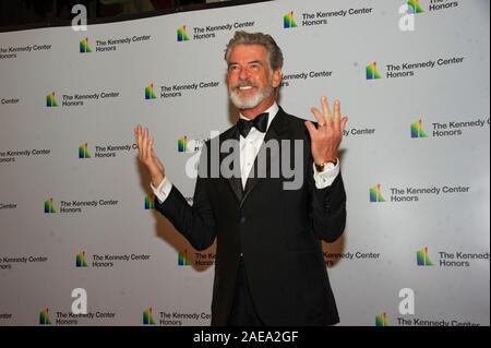 Washington DC, USA. 07th Dec, 2019. Pierce Brosnan arrives for the formal Artist's Dinner honoring the recipients of the 42nd Annual Kennedy Center Honors at the United States Department of State in Washington, DC on Saturday, December 7, 2019. The 2019 honorees are: Earth, Wind & Fire, Sally Field, Linda Ronstadt, Sesame Street, and Michael Tilson Thomas.Credit: Ron Sachs/Pool via CNP | usage worldwide Credit: dpa/Alamy Live News Stock Photo