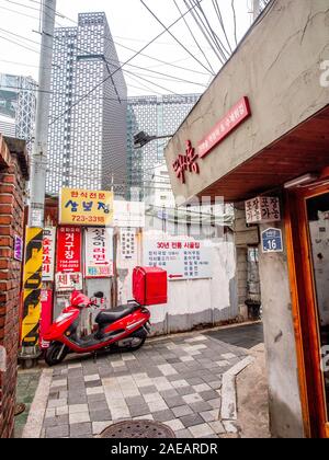 Cityscape, urban street, Suzuki Excite Moor Scooter, parked in narrow alley, Insadong, Seoul, South Korea Stock Photo