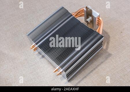 Personal computer new part heating radiator cooler thermostat made from aluminum metal. Stock Photo