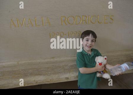 boy close to the tomb of Amália Rodrigues, the famous portuguese fado singer, in the National Pantheon of Portugal. Stock Photo