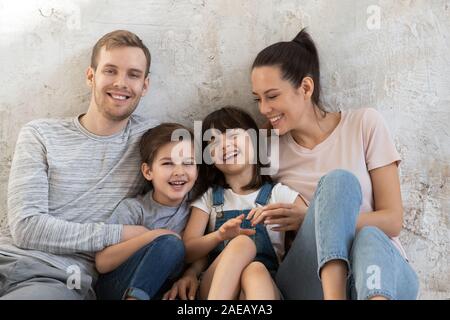 Close up portrait of happy family of parent and children. Stock Photo