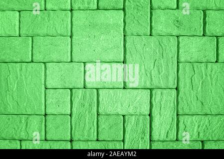 Highly detailed street pavement background with geometric pattern made of square blocks of different sizes with textured rough surface toned in shades Stock Photo
