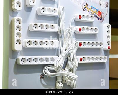 Extension cord and power strip in store Stock Photo