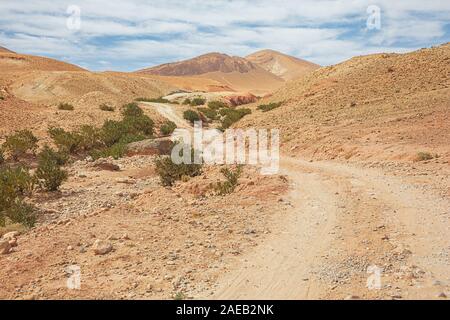 Desert road through the mountains near the Dades Gorges Stock Photo