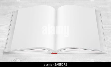 Open book on a white wooden table. Stock Photo